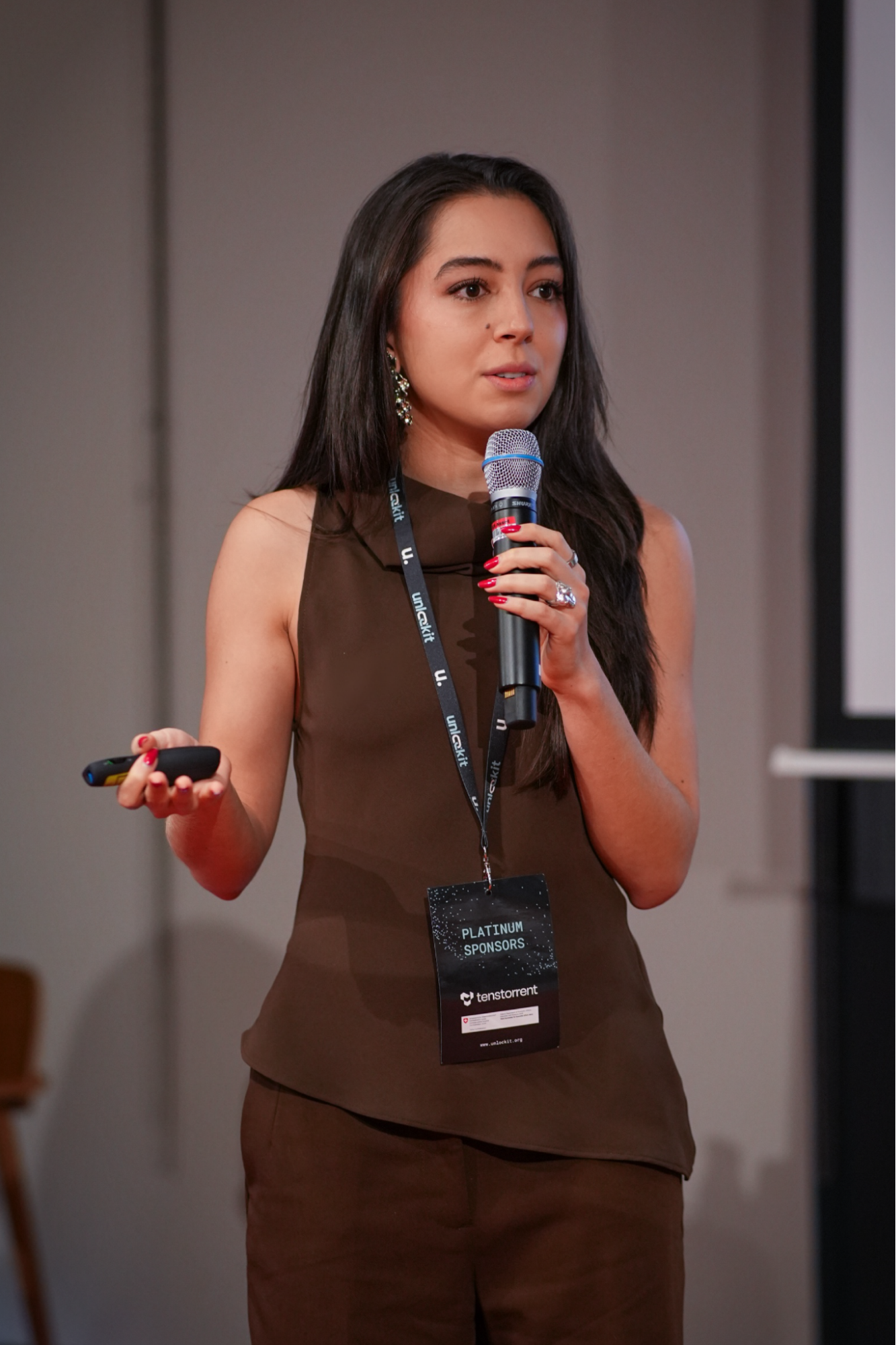 Diandra speaking on stage